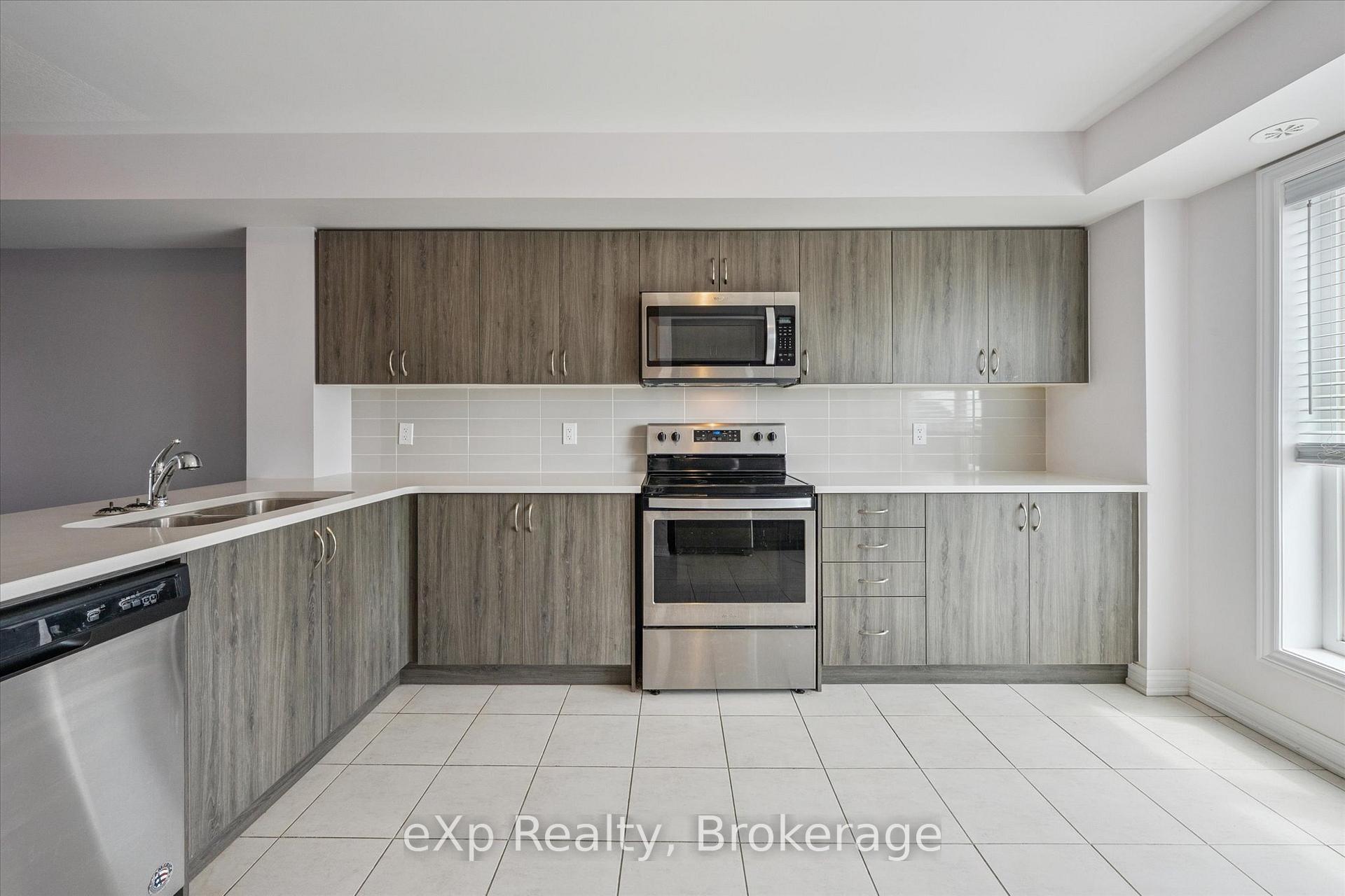 Photo 10 of Unit 4, 124 Watson Parkway N, Guelph, Grange Road — HOMEH