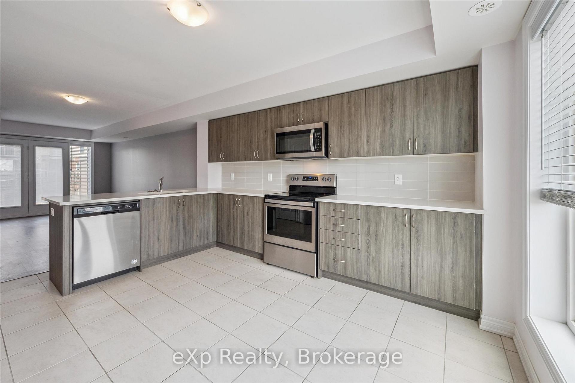 Photo 11 of Unit 4, 124 Watson Parkway N, Guelph, Grange Road — HOMEH
