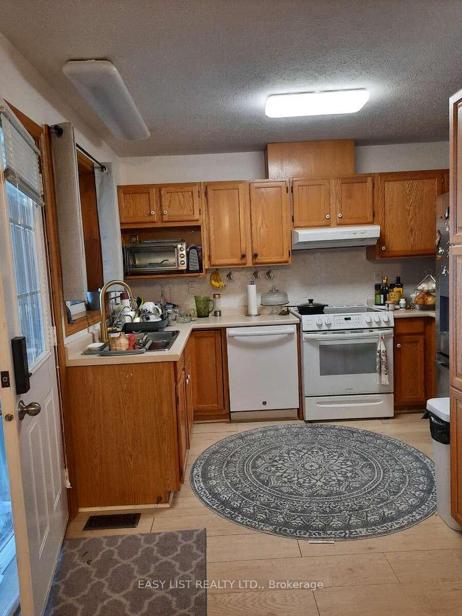 Photo 5 of Unit 7, 8525 Little River Road, Windsor — HOMEH