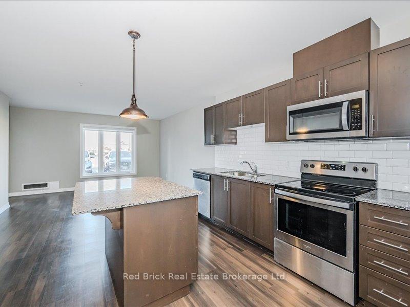 Photo 10 of Unit 003, 104 Summit Ridge Drive, Guelph, Grange Road — HOMEH