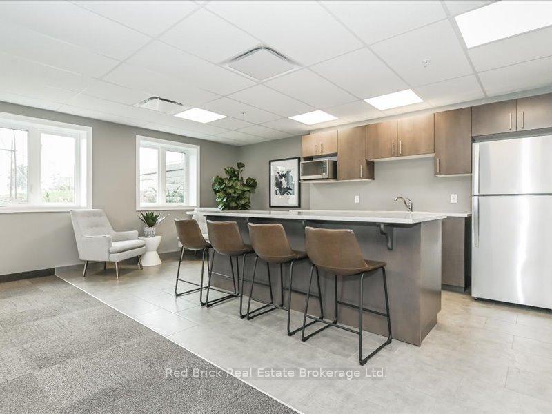 Photo 30 of Unit 003, 104 Summit Ridge Drive, Guelph, Grange Road — HOMEH