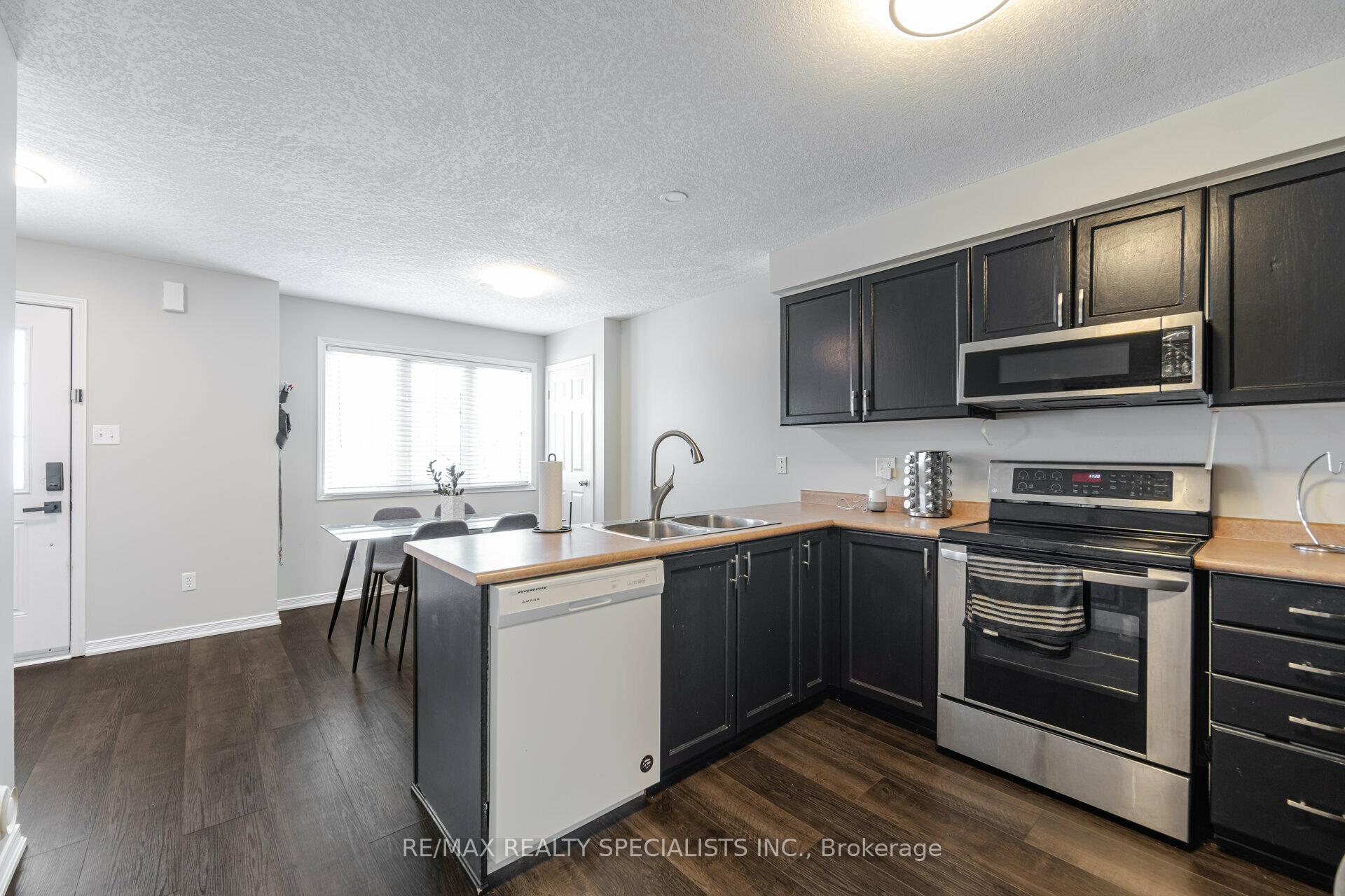Photo 2 of Unit 8A, 50 Howe Drive, Kitchener — HOMEH
