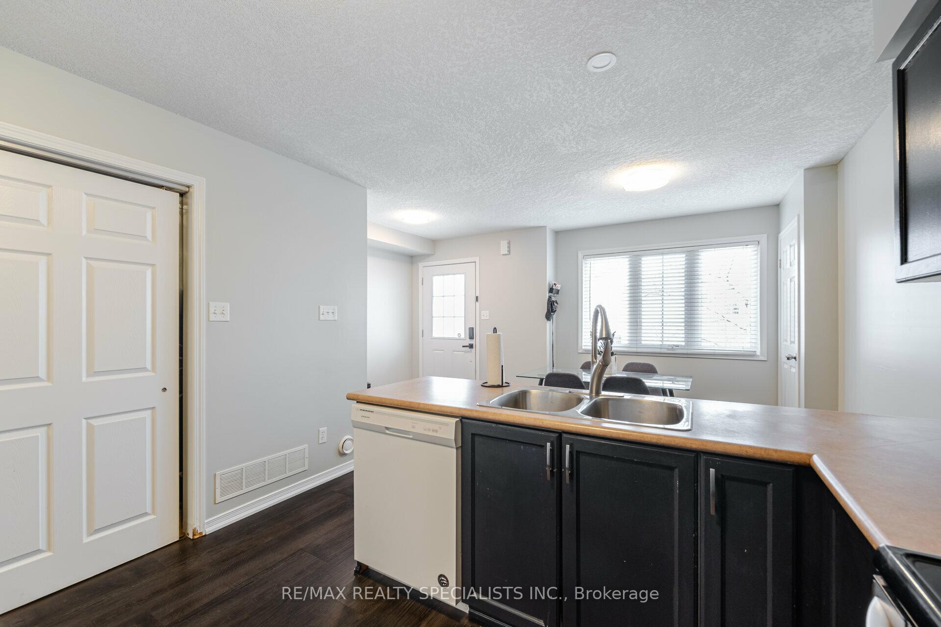 Photo 4 of Unit 8A, 50 Howe Drive, Kitchener — HOMEH