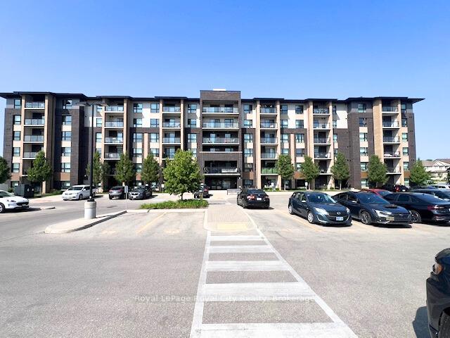 Photo 1 of Unit 309, 7 Kay Crescent, Guelph, Pineridge/Westminster Woods — HOMEH