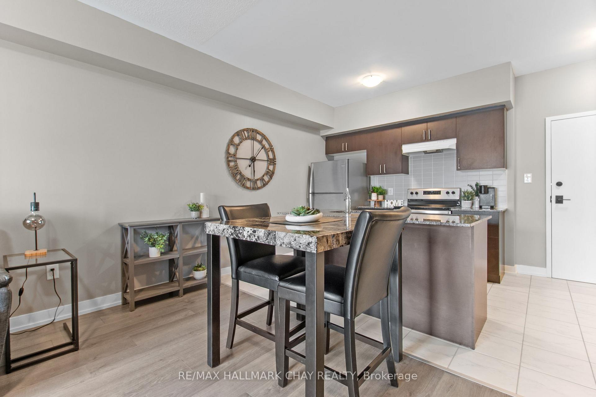 Photo 5 of Unit 211, 4 Spice Way, Barrie, Innis-Shore — HOMEH