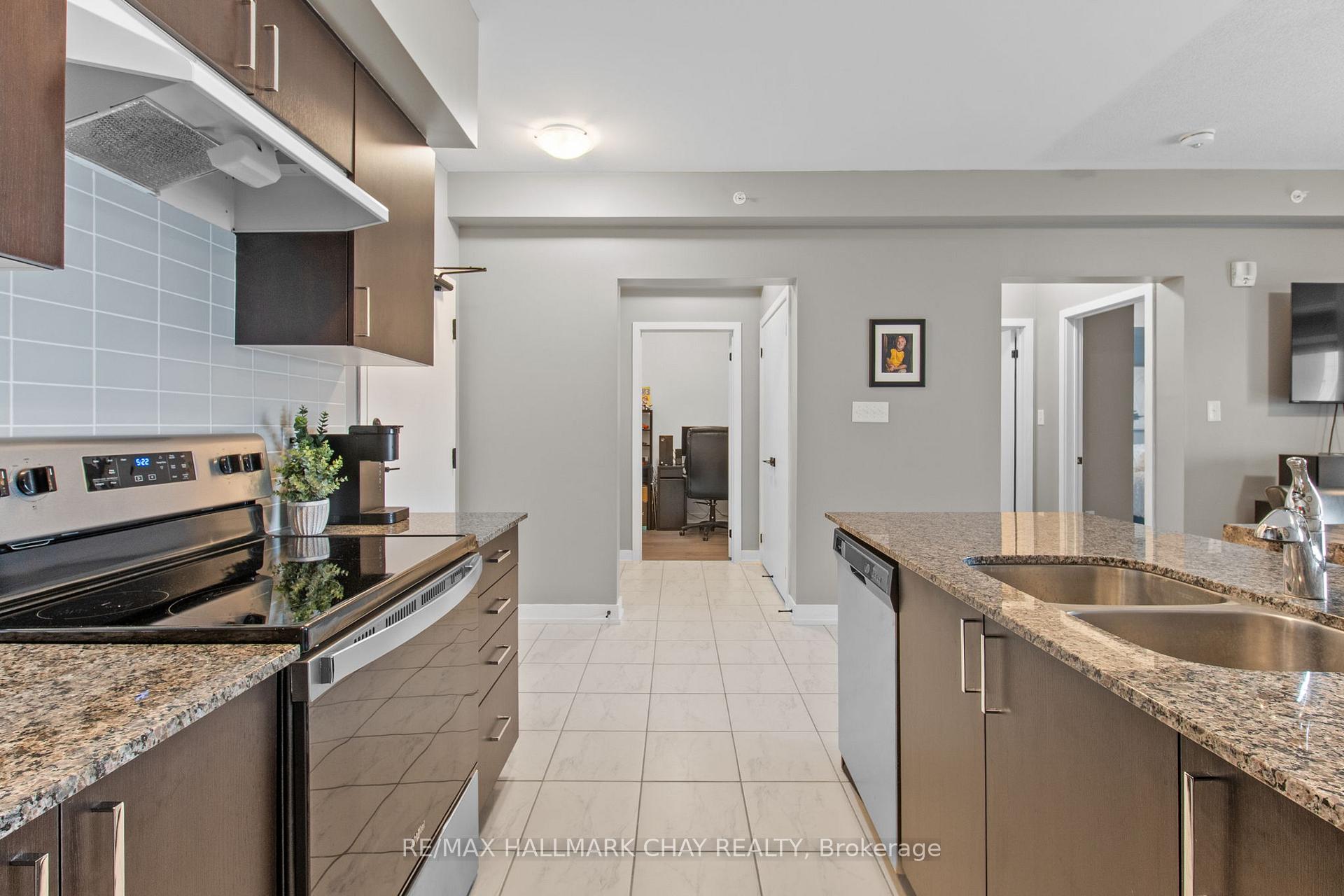 Photo 6 of Unit 211, 4 Spice Way, Barrie, Innis-Shore — HOMEH