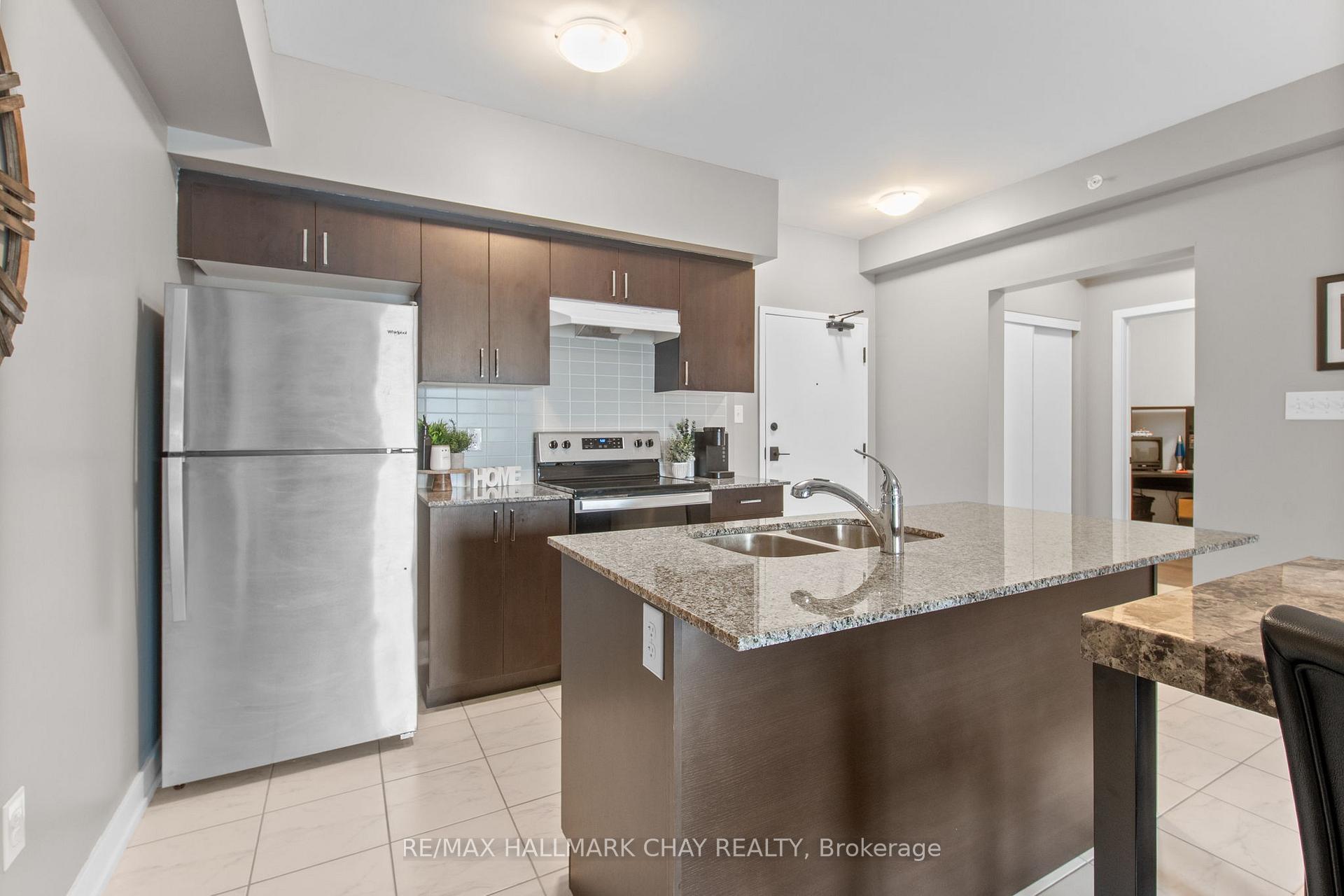 Photo 7 of Unit 211, 4 Spice Way, Barrie, Innis-Shore — HOMEH