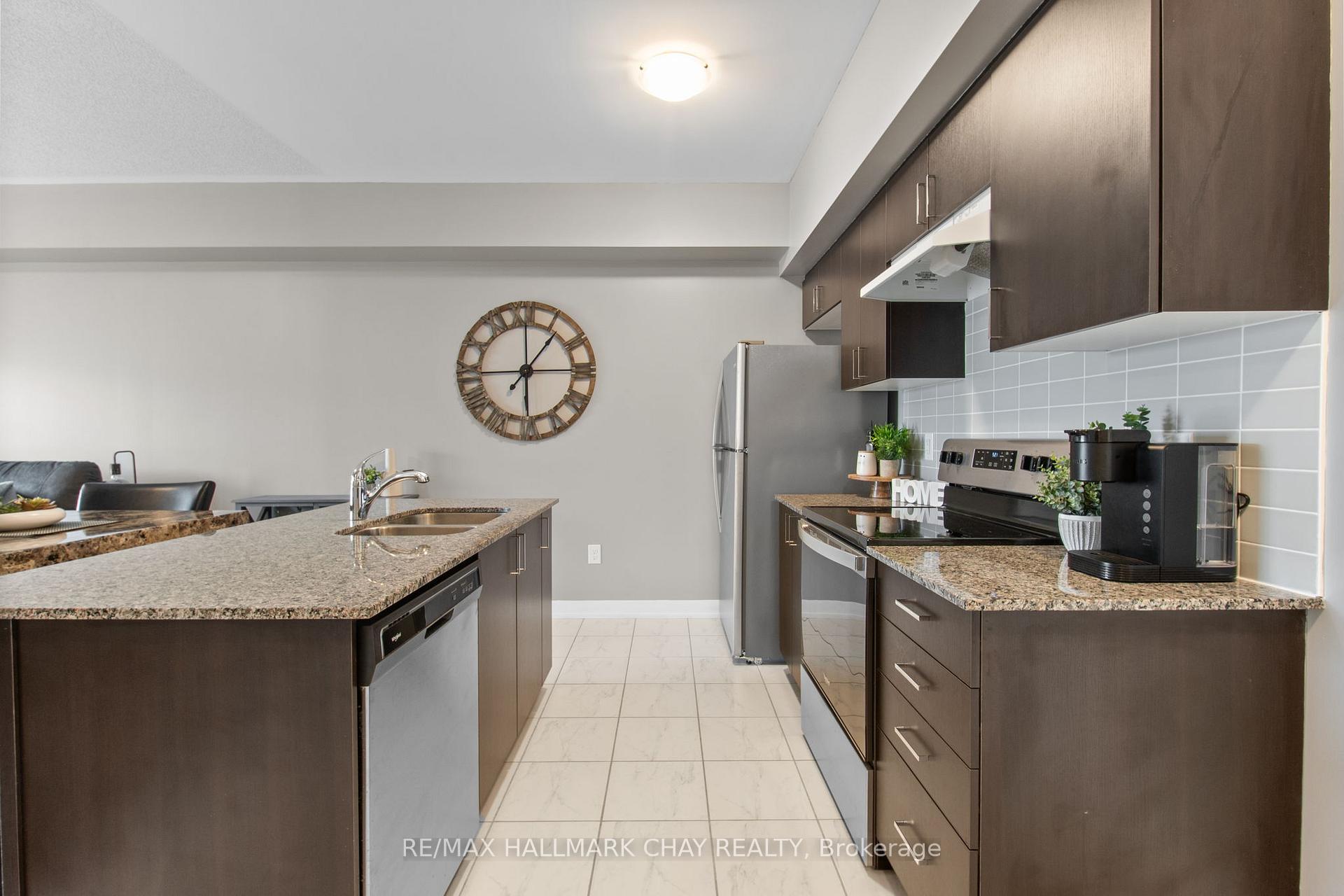 Photo 8 of Unit 211, 4 Spice Way, Barrie, Innis-Shore — HOMEH
