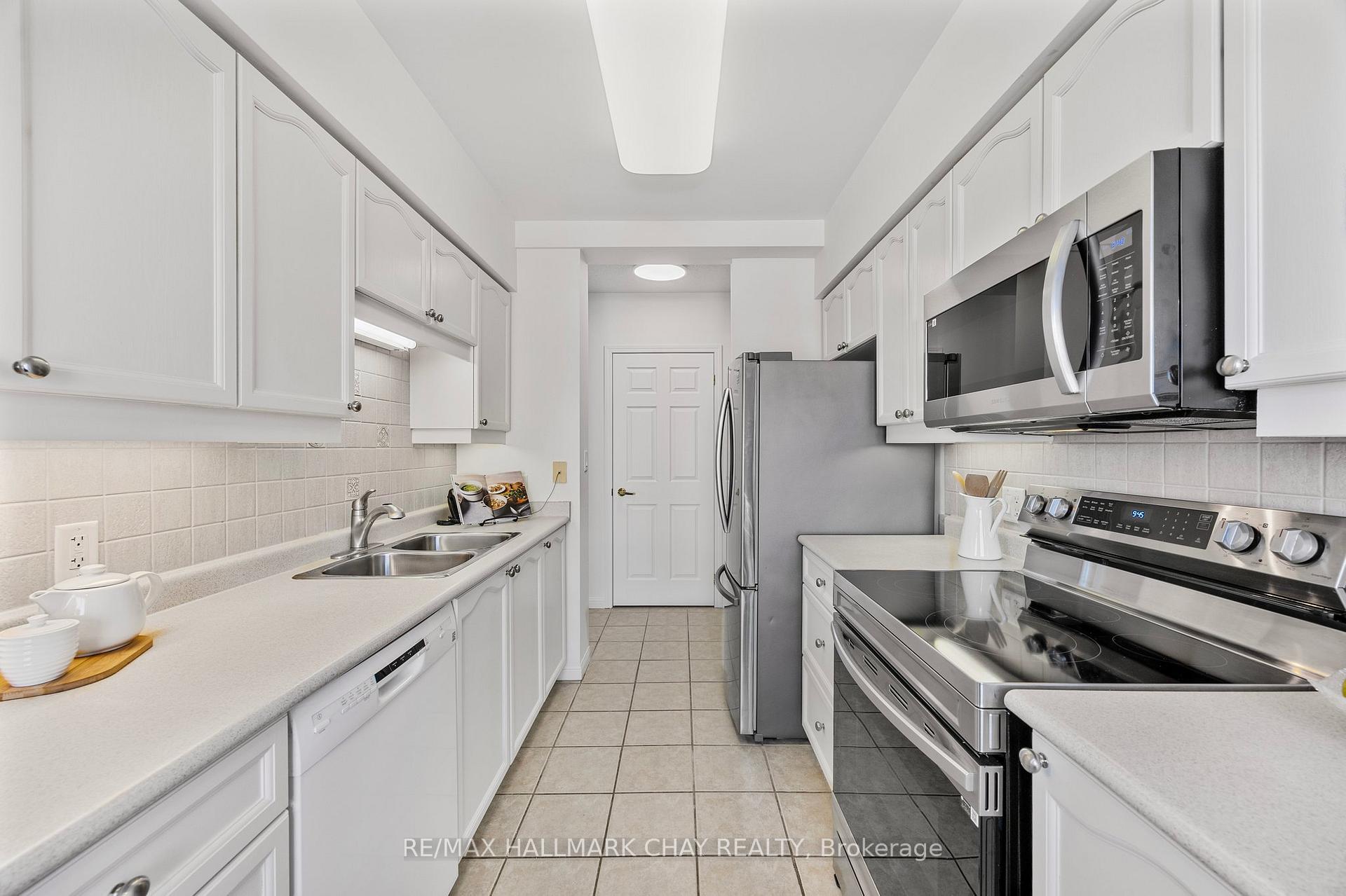 Photo 8 of Unit 412, 90 Dean Avenue, Barrie, Painswick South — HOMEH