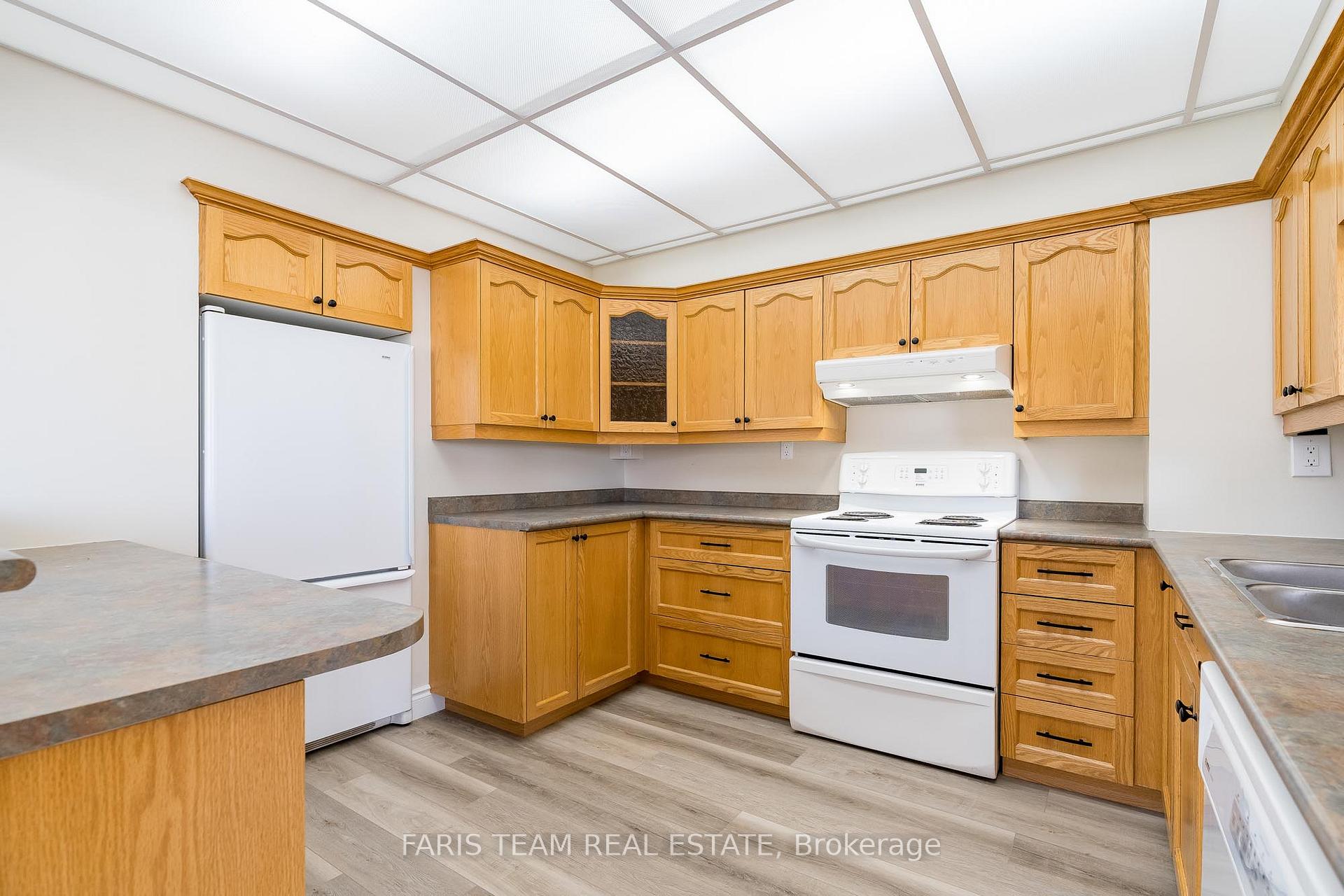 Photo 3 of Unit 106, 181 Collier Street, Barrie, North Shore — HOMEH