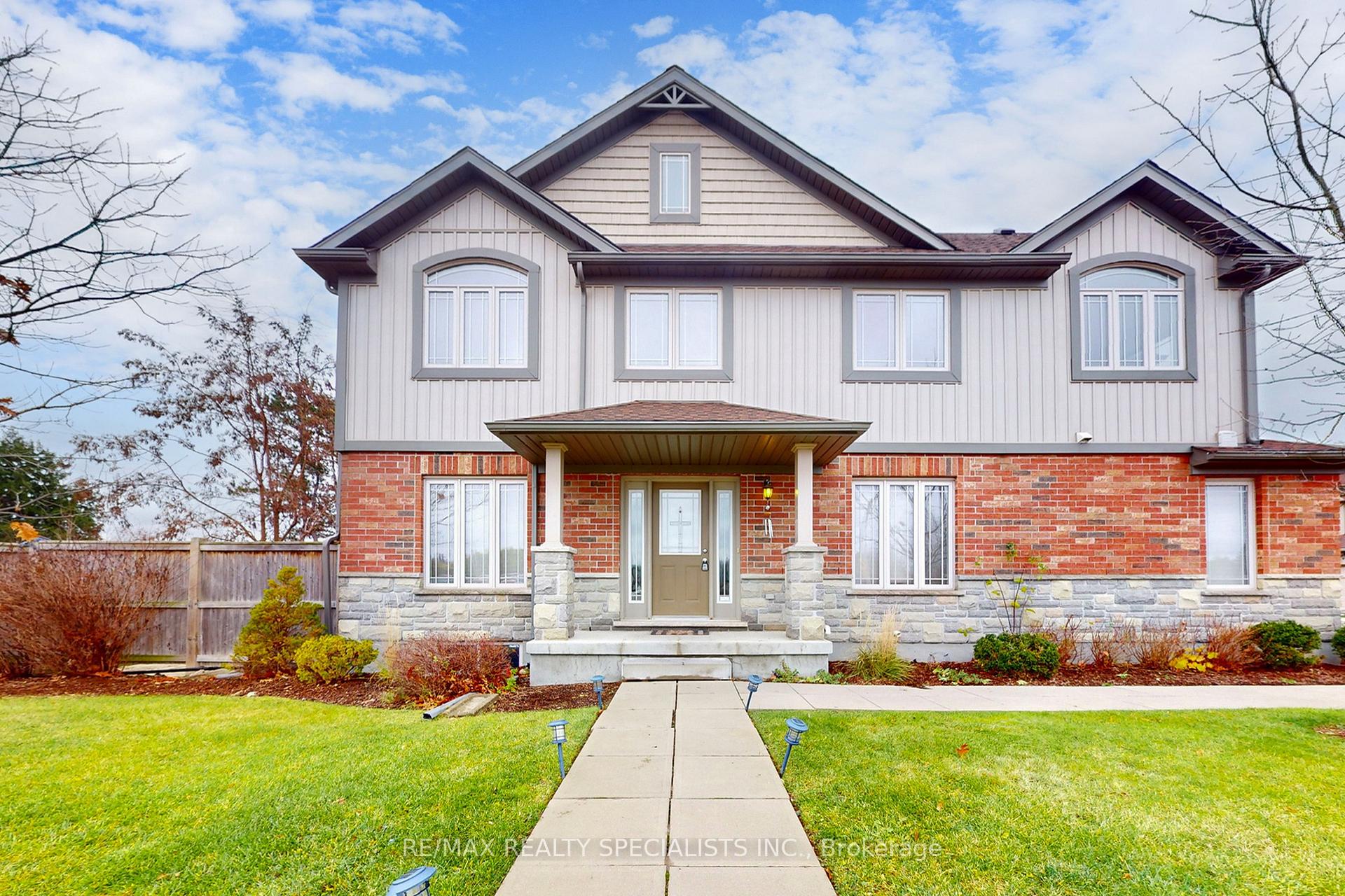 Photo 1 of Unit 21, 355 Macalister Boulevard, Guelph, Kortright East — HOMEH