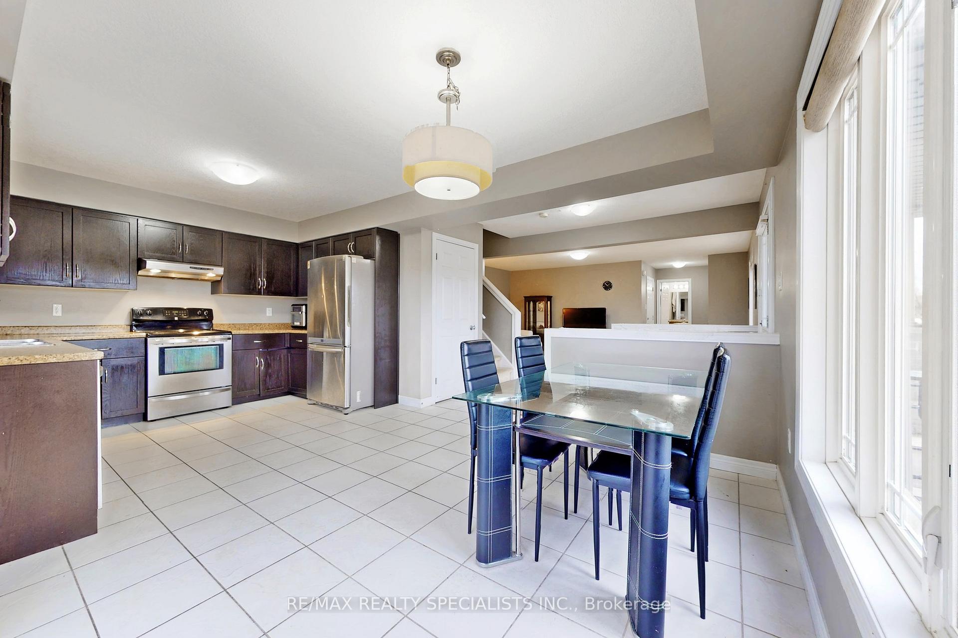 Photo 38 of Unit 21, 355 Macalister Boulevard, Guelph, Kortright East — HOMEH