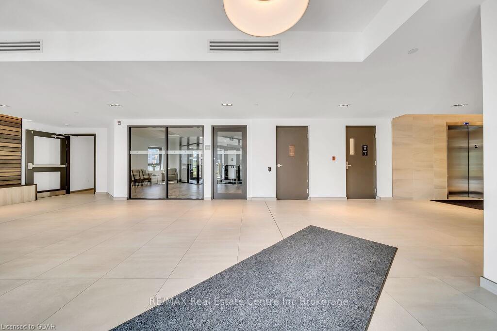 Photo 3 of Unit 101, 332 Gosling Gardens, Guelph, Clairfields/Hanlon Business Park — HOMEH