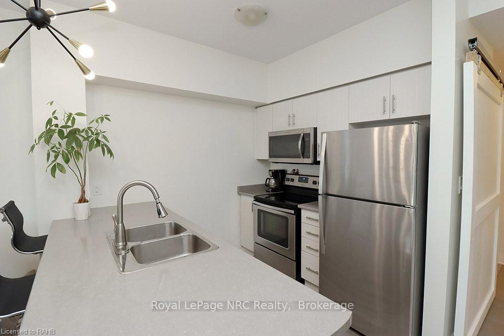 Photo 2 of Unit 104, 10 Concord Place, Grimsby, Grimsby Beach — HOMEH