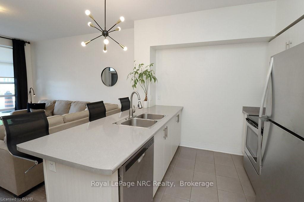 Photo 12 of Unit 104, 10 Concord Place, Grimsby, Grimsby Beach — HOMEH
