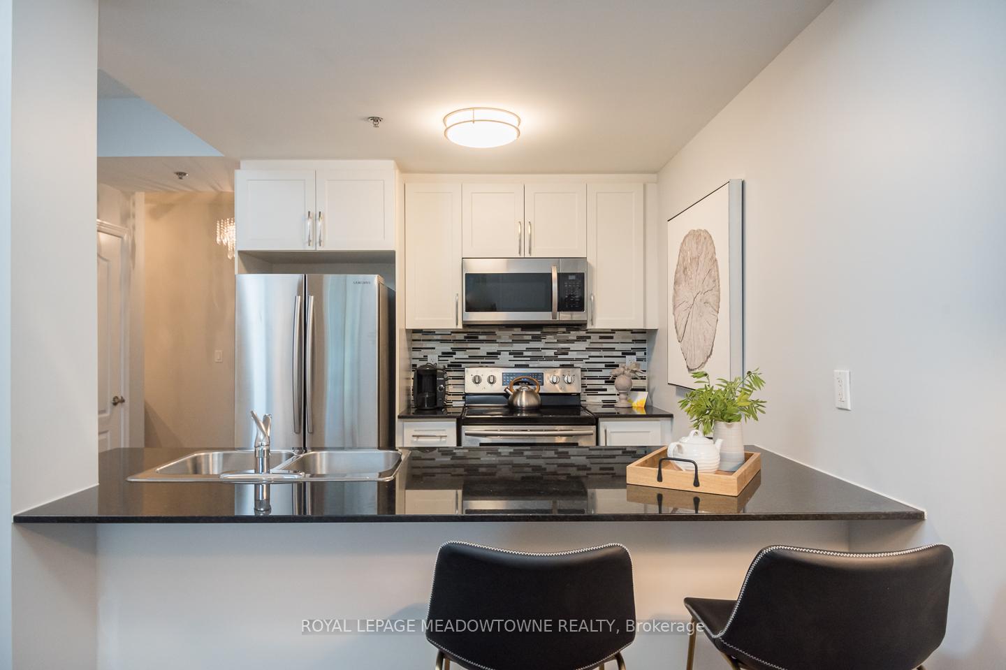 Photo 5 of Unit 501, 1421 Costigan Road, Milton, Clarke — HOMEH