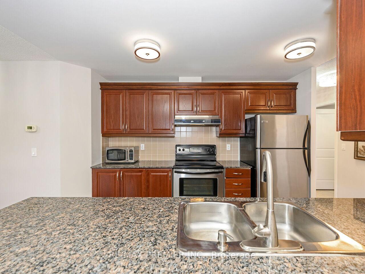Photo 11 of Unit 218, 8026 Kipling Avenue, Vaughan, West Woodbridge — HOMEH
