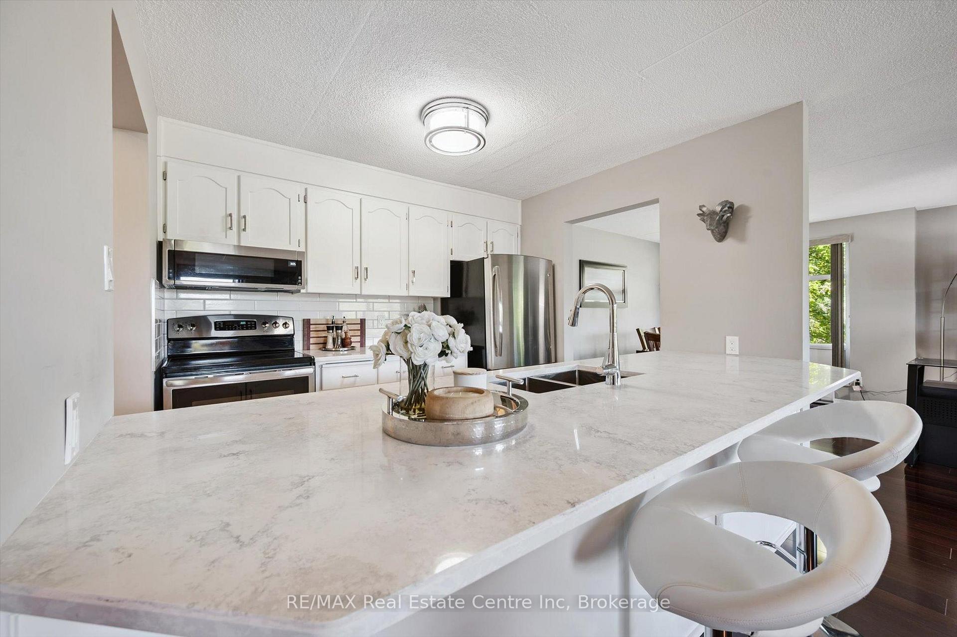 Photo 2 of Unit 306, 8 Christopher Court, Guelph, Kortright West — HOMEH