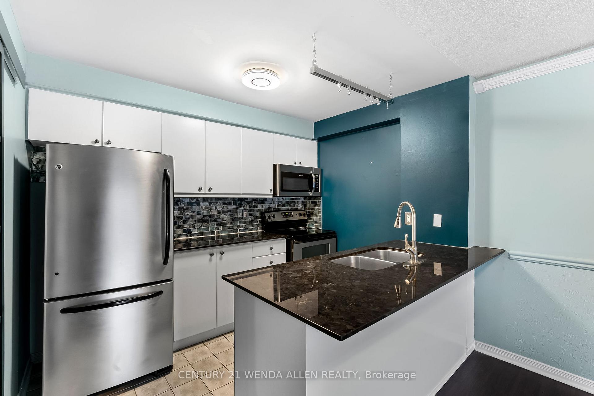 Photo 12 of Unit #309, 98 Aspen Spring Drive, Clarington, Bowmanville — HOMEH