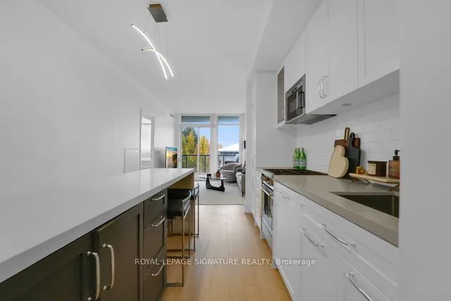 Photo 4 of Unit 314, 25 Malcolm Road, Toronto, Leaside — HOMEH