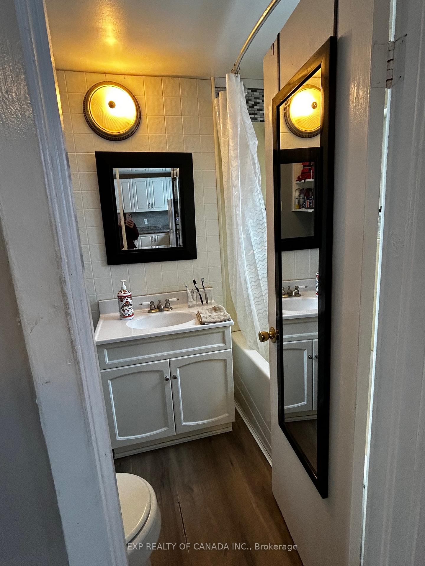 Photo 9 of 206 Eleventh Avenue, Cochrane — HOMEH