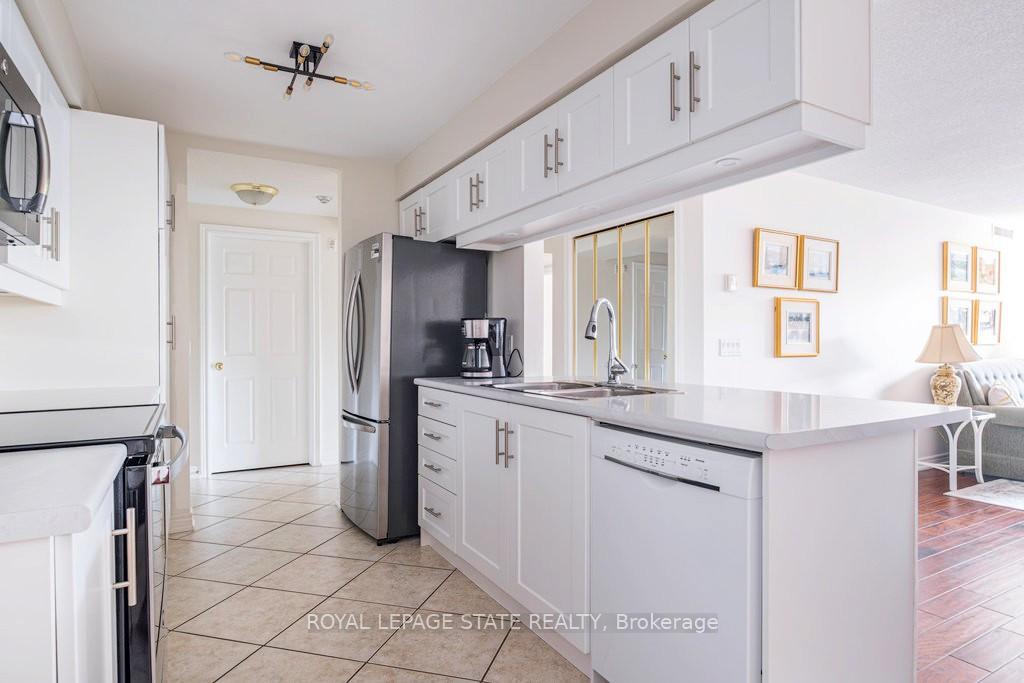 Photo 4 of Unit 208, 990 Golf Links Road, Hamilton, Meadowlands — HOMEH