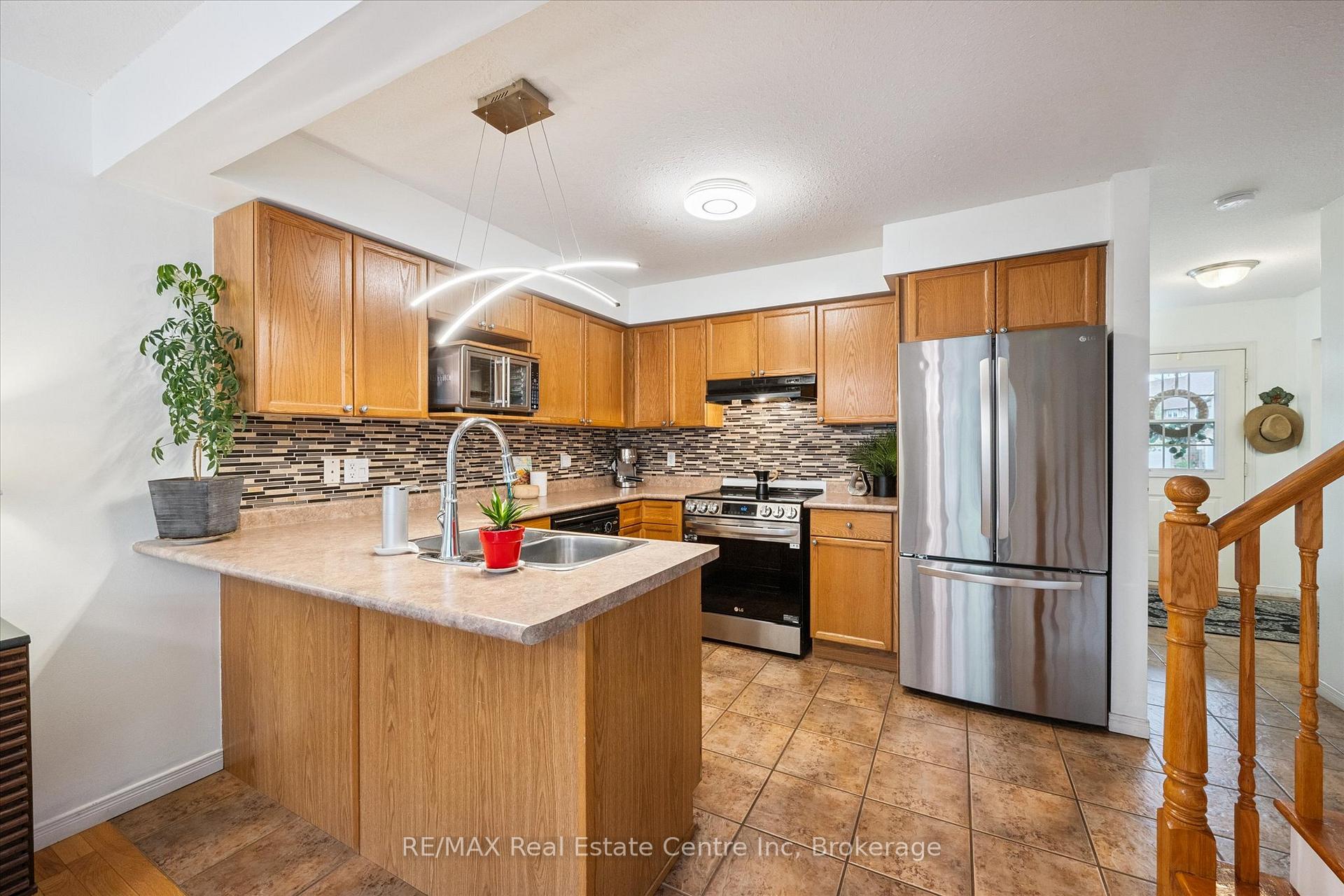Photo 9 of Unit 24, 31 Schroder Crescent, Guelph, Grange Road — HOMEH