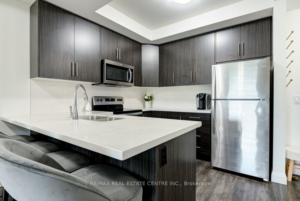 Photo 13 of Unit 407, 30 Hamilton Street S, Hamilton, Waterdown — HOMEH