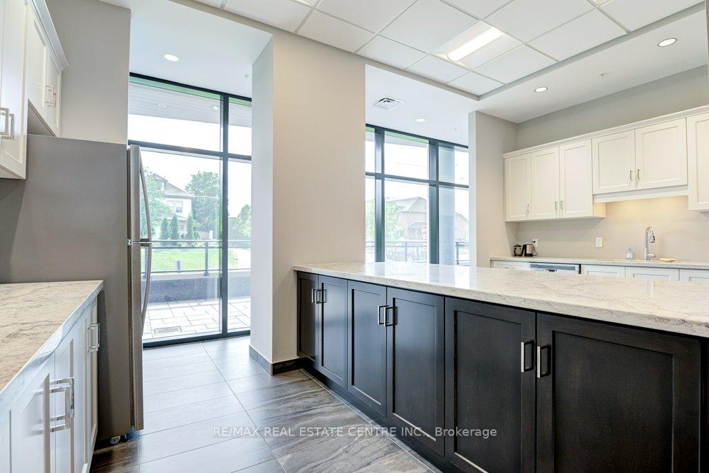 Photo 32 of Unit 407, 30 Hamilton Street S, Hamilton, Waterdown — HOMEH