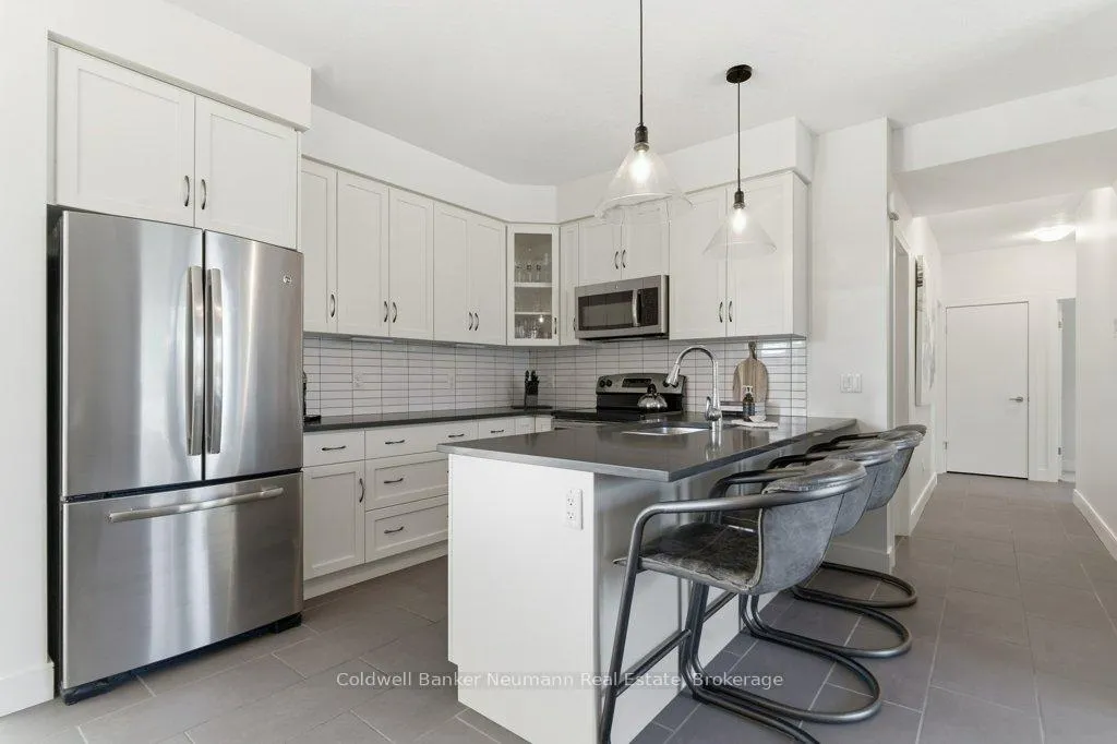 Photo 11 of Unit 14, 32 Arkell Road, Guelph, Kortright East — HOMEH