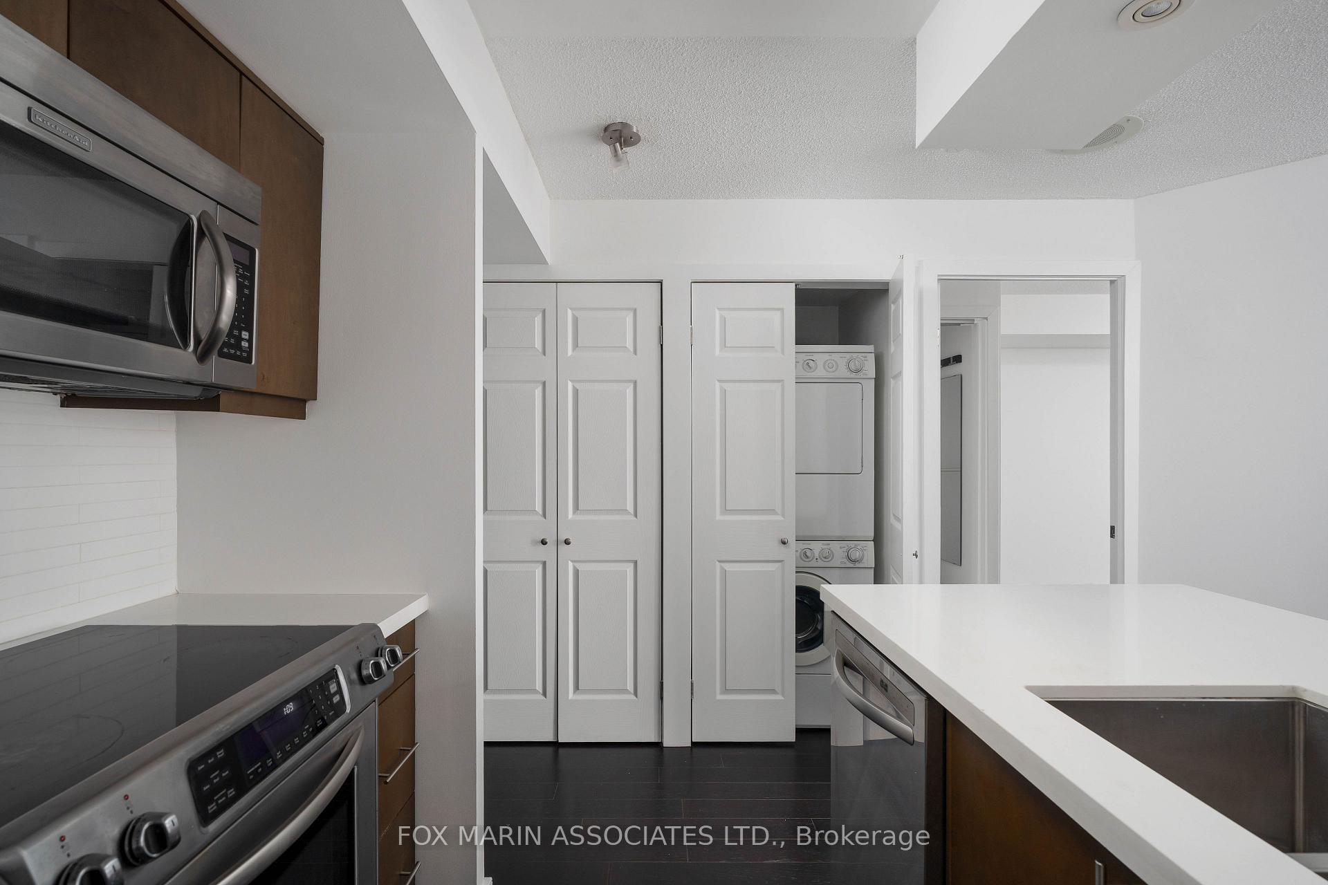 Photo 4 of Unit 1023, 109 Front Street E, Toronto, Moss Park — HOMEH