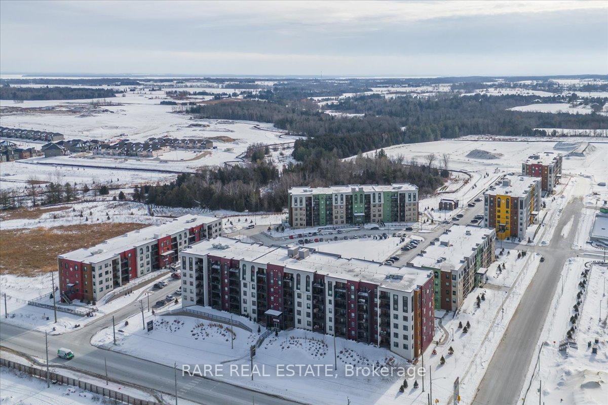 Photo 3 of Unit 210, 4 Spice Way, Barrie, Rural Barrie Southeast — HOMEH