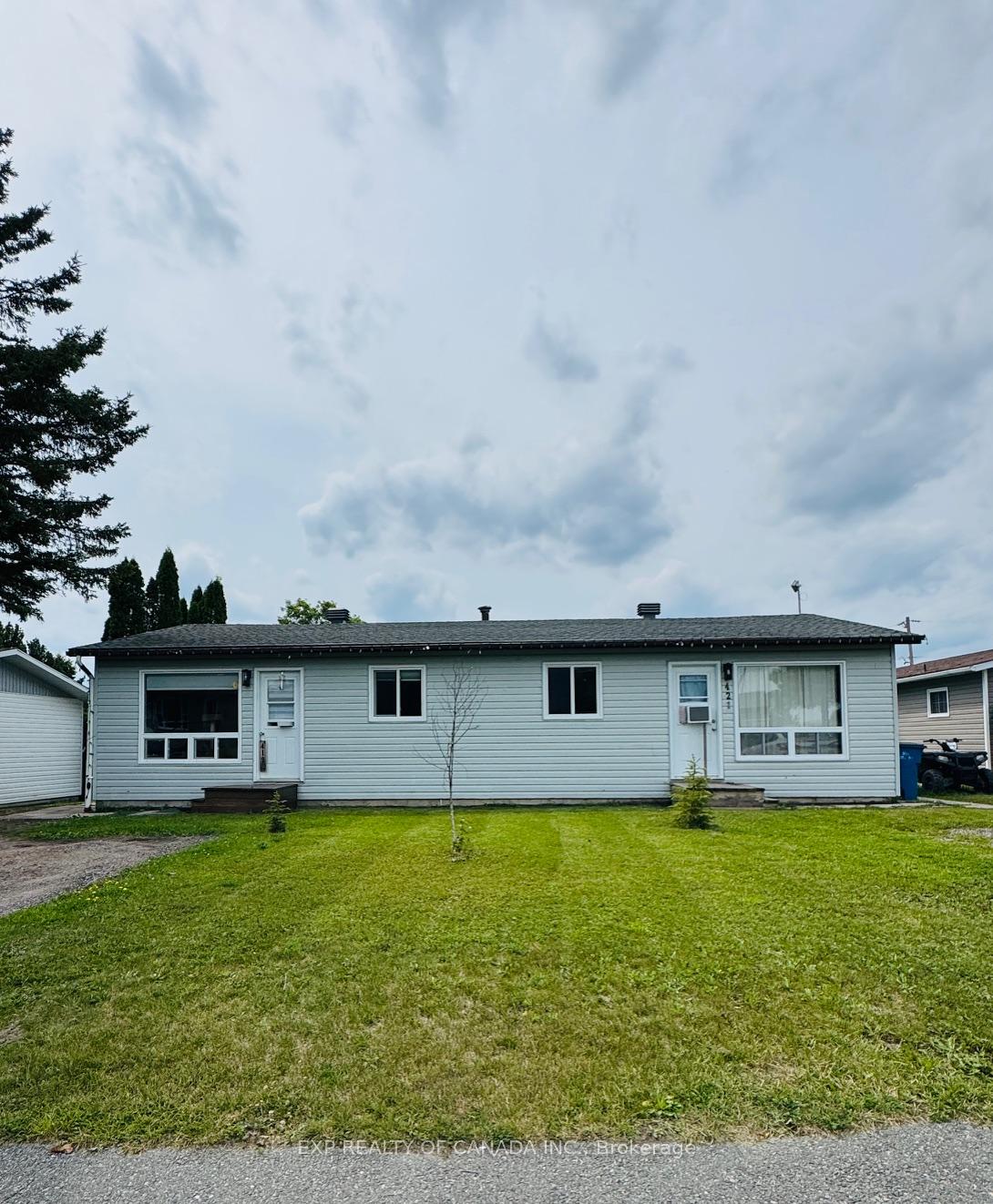Photo 1 of 419-421 Sixteenth Avenue, Cochrane — HOMEH