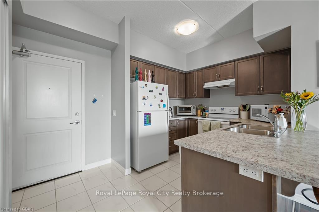 Photo 11 of Unit 215, 1284 Gordon Street, Guelph, Kortright East — HOMEH