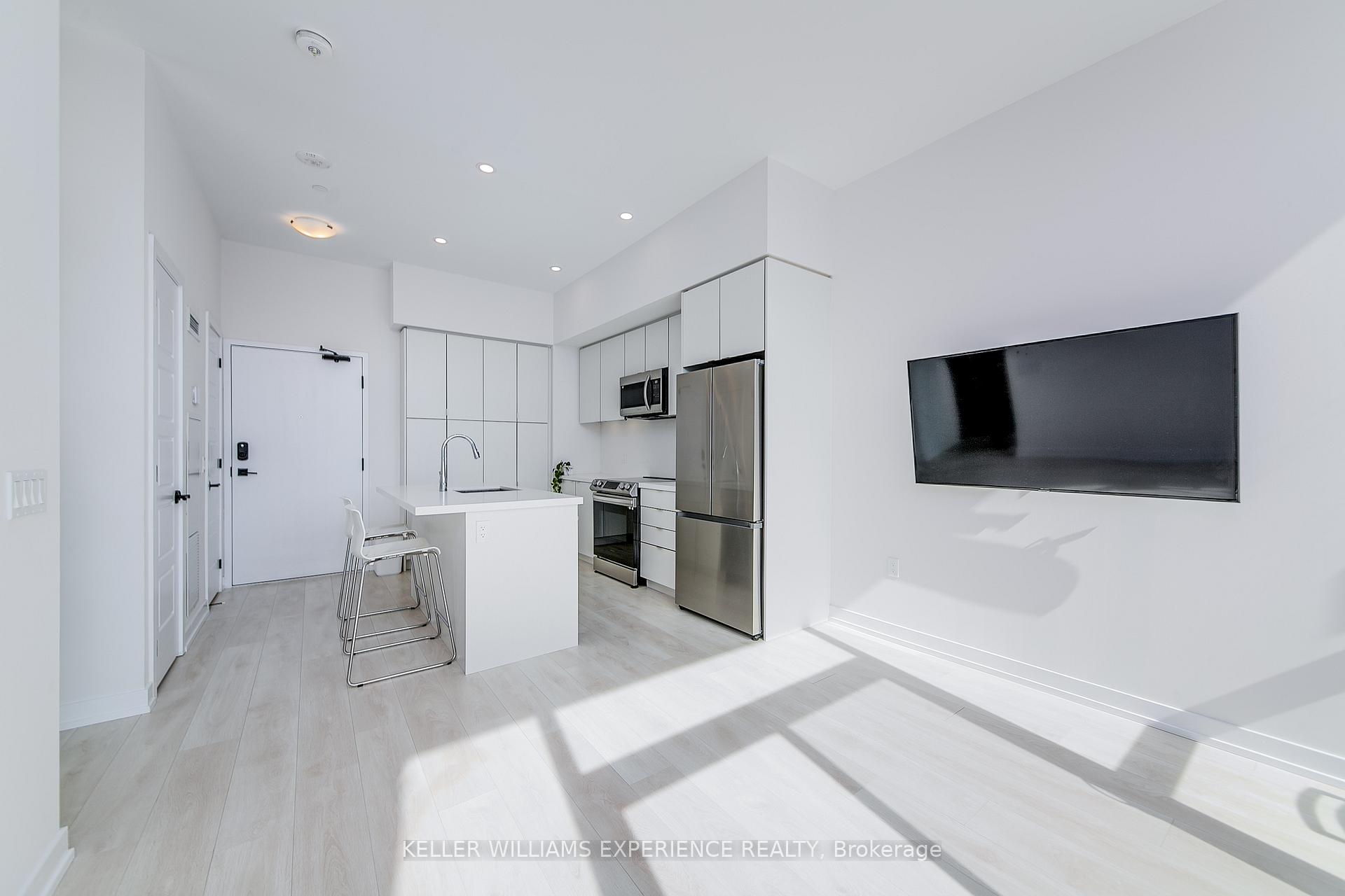 Photo 2 of Unit 402, 415 Sea Ray Avenue, Innisfil, Rural Innisfil — HOMEH