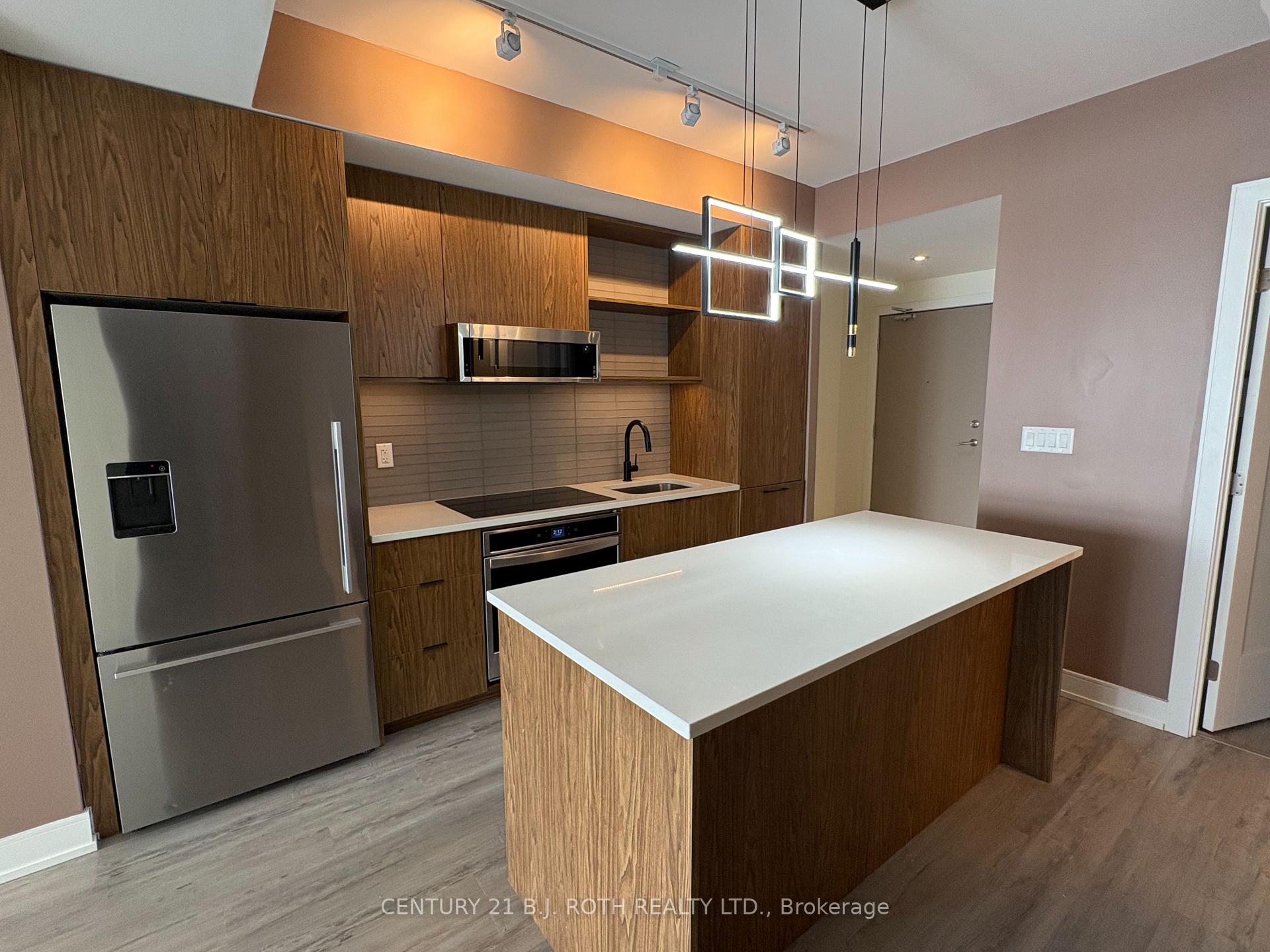 Photo 6 of Unit 609, 185 Dunlop Street, Barrie, Lakeshore — HOMEH