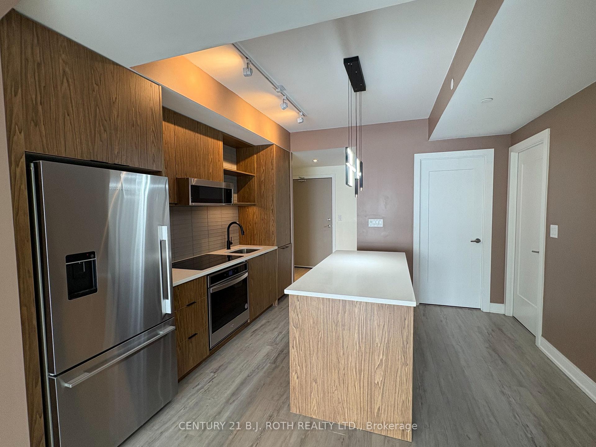Photo 8 of Unit 609, 185 Dunlop Street, Barrie, Lakeshore — HOMEH