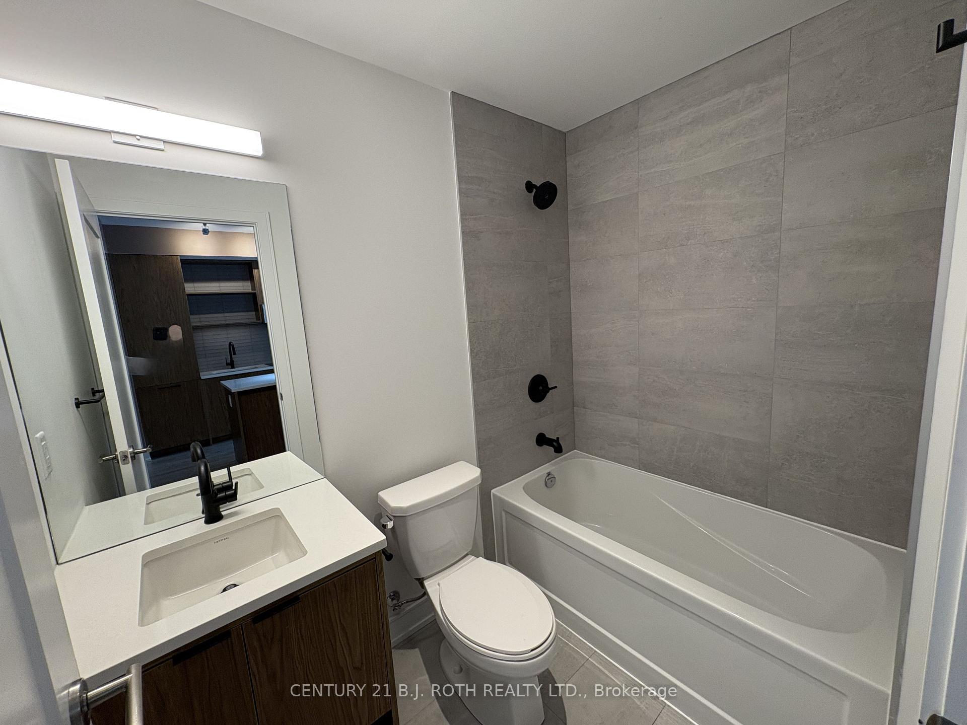 Photo 10 of Unit 609, 185 Dunlop Street, Barrie, Lakeshore — HOMEH