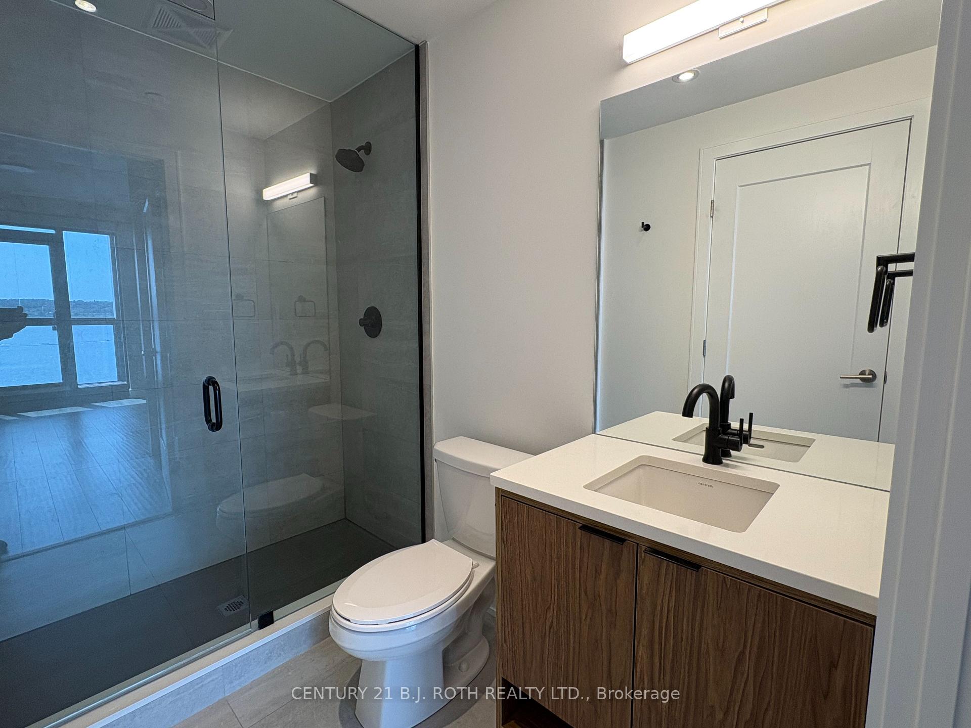 Photo 14 of Unit 609, 185 Dunlop Street, Barrie, Lakeshore — HOMEH