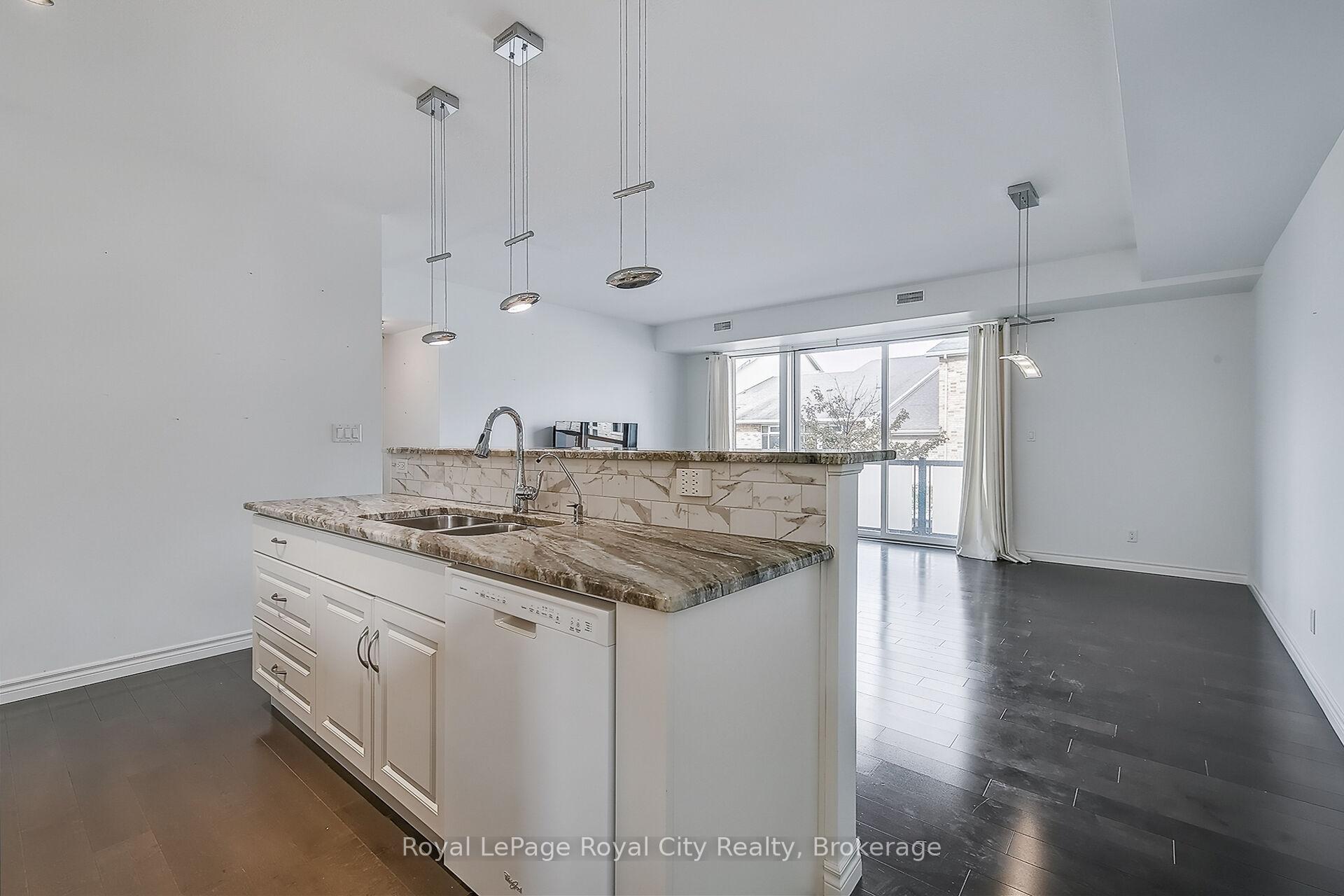 Photo 5 of Unit 2, 32 Arkell Road, Guelph, Kortright East — HOMEH