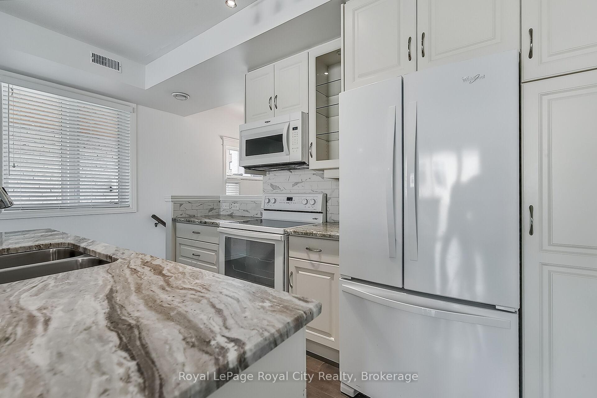 Photo 8 of Unit 2, 32 Arkell Road, Guelph, Kortright East — HOMEH