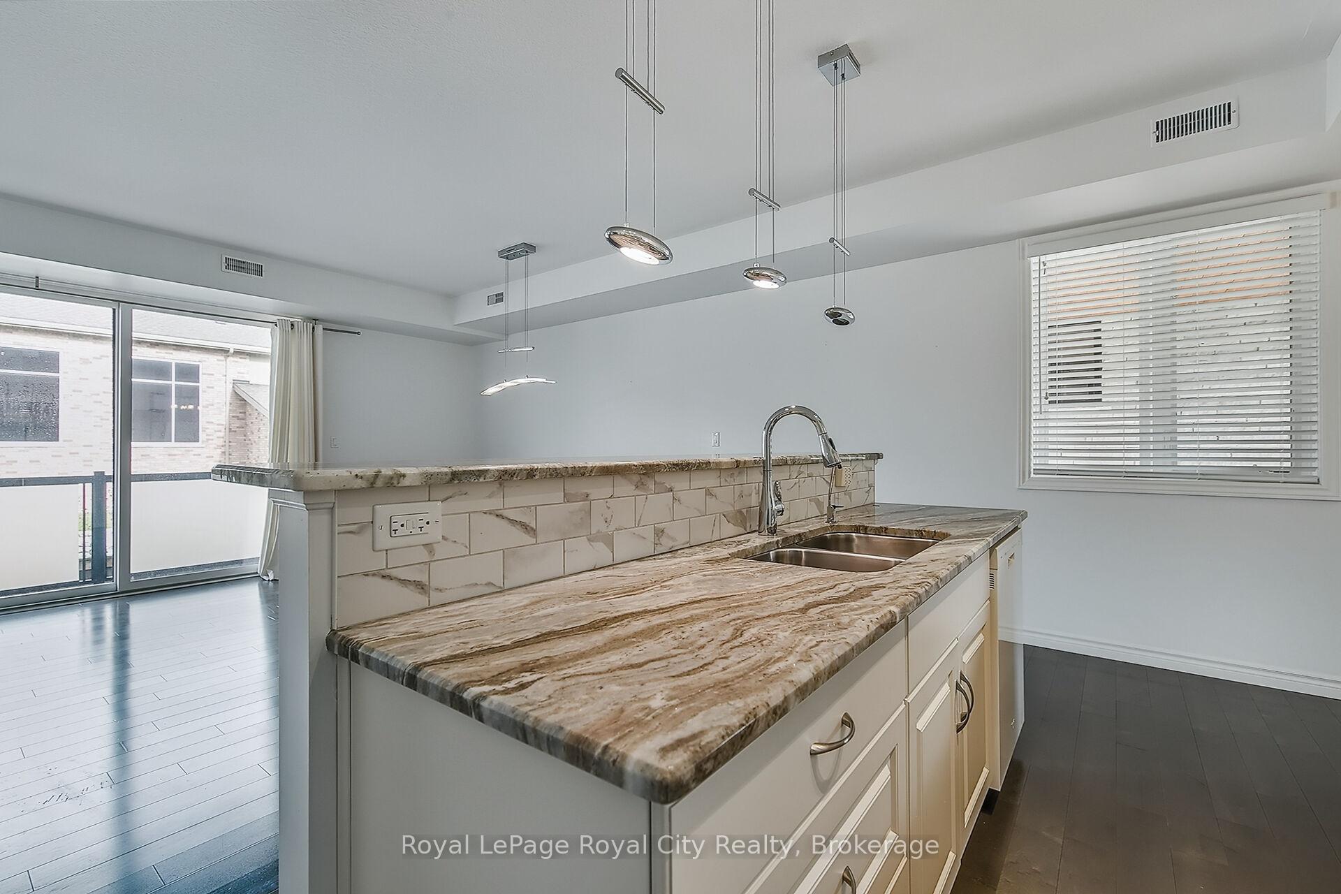Photo 9 of Unit 2, 32 Arkell Road, Guelph, Kortright East — HOMEH