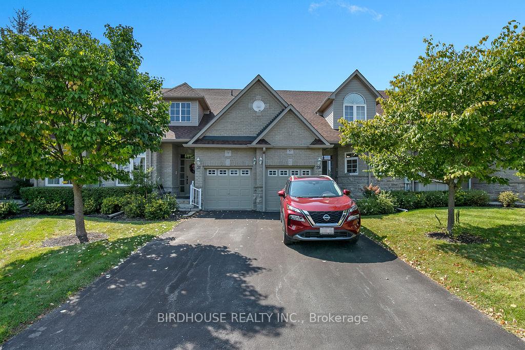Photo 1 of Unit 7F, 31 Rivermill Boulevard, Kawartha Lakes, Lindsay — HOMEH