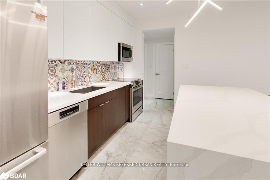 Photo 11 of Unit 309, 295 Cundles Road E, Barrie, Alliance — HOMEH