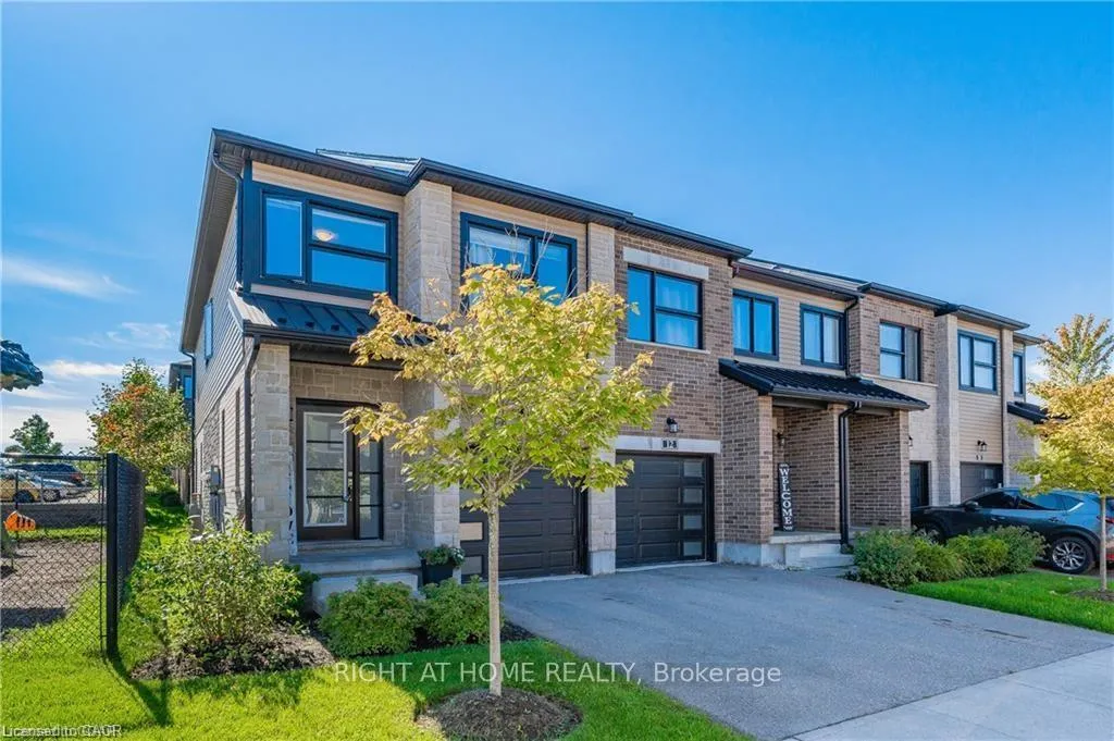 Photo 1 of Unit 13, 91 poppy Drive E, Guelph, Pineridge/Westminster Woods — HOMEH