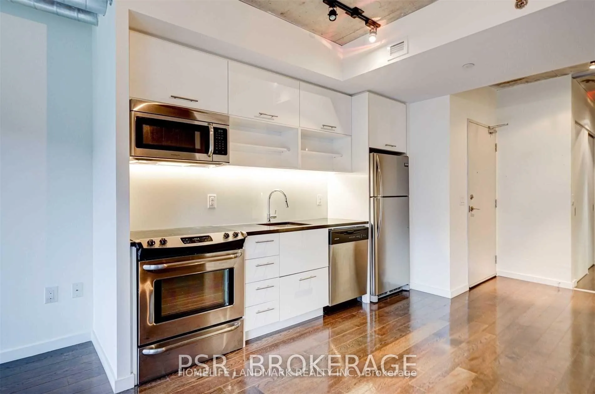 Photo 5 of Unit 617, 32 Trolley Crescent, Toronto, Moss Park — HOMEH