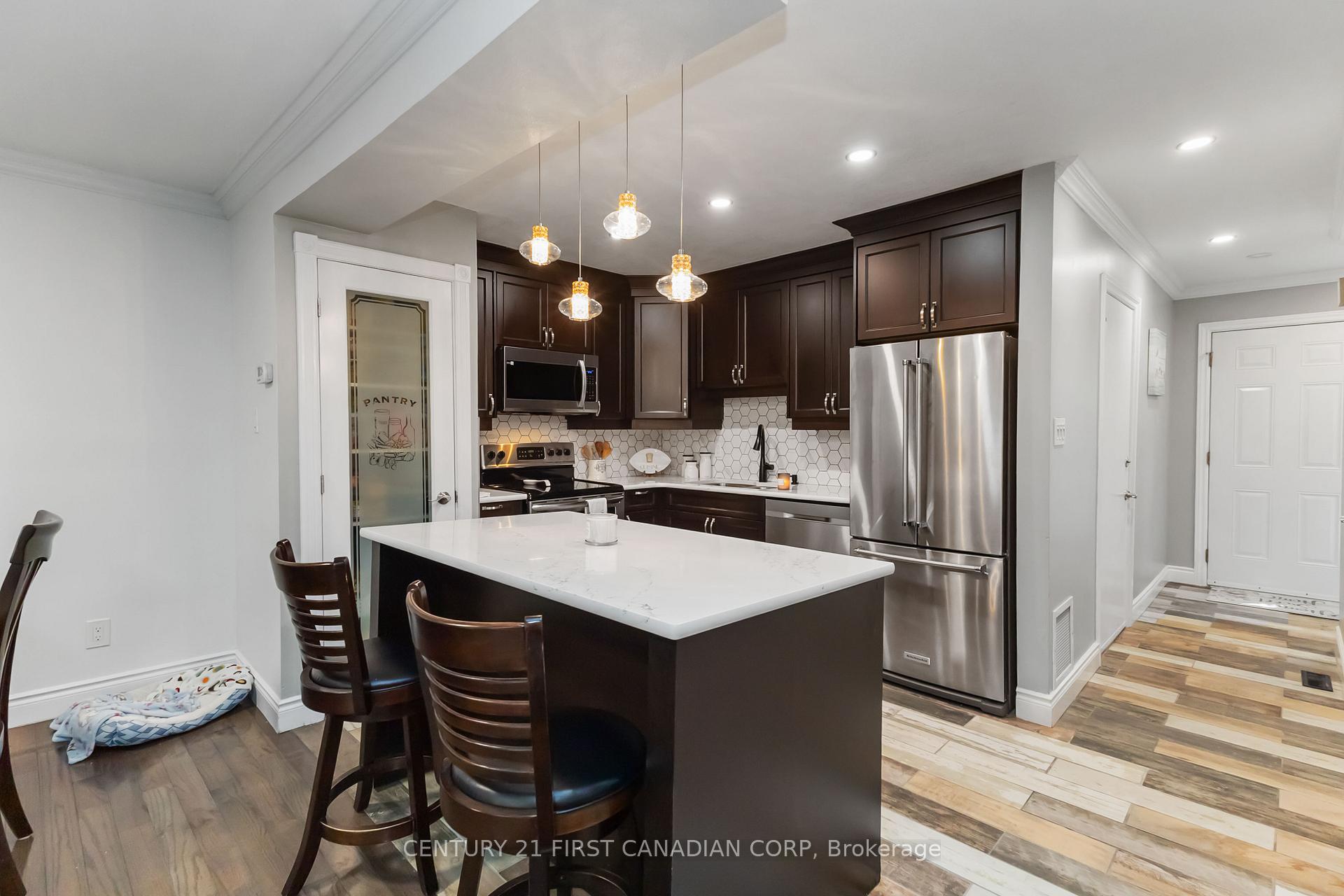 Photo 6 of Unit 7, 131 Bonaventure Drive, London, East I — HOMEH