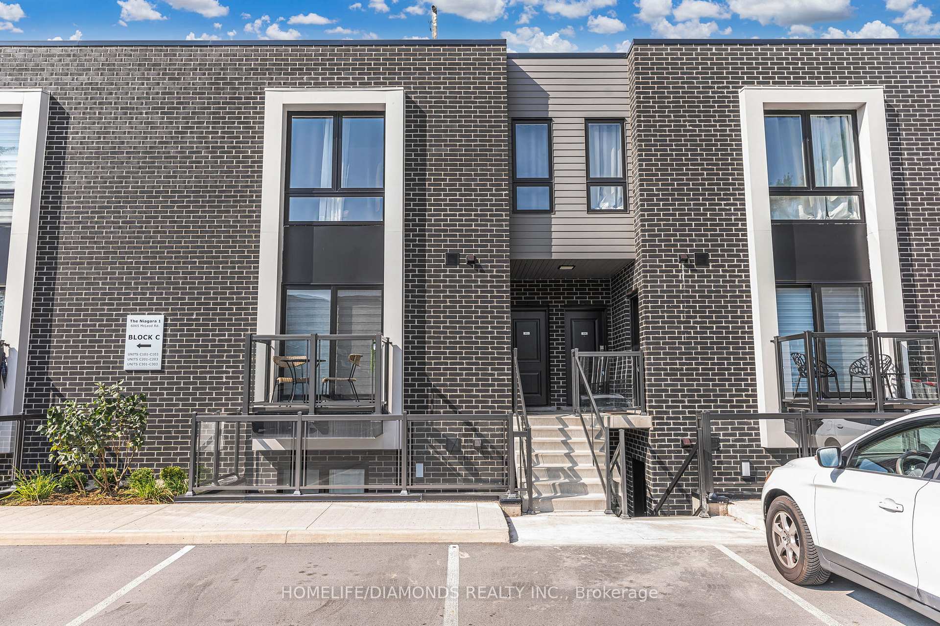 Front of Unit 203, 6065 Mcleod Road