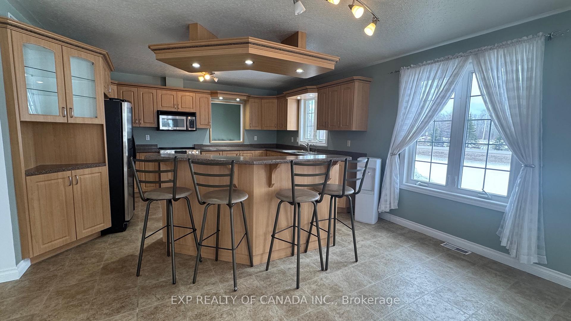 Photo 3 of 1467 Hwy 652 E, Cochrane — HOMEH