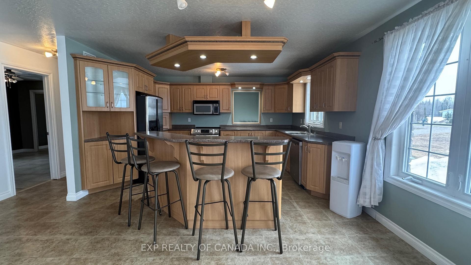 Photo 4 of 1467 Hwy 652 E, Cochrane — HOMEH